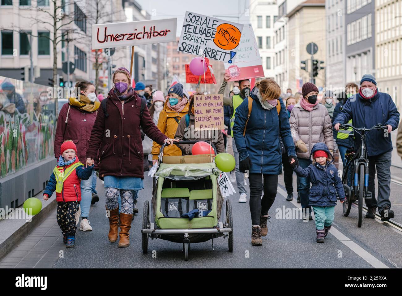 hanover-germany-30th-mar-2022-social-workers-demonstrate-together-with-their-children-in-the-city-center-during-a-warning-strike-the-trade-union-verdi-called-the-employees-to-renewed-warning-strikes-and