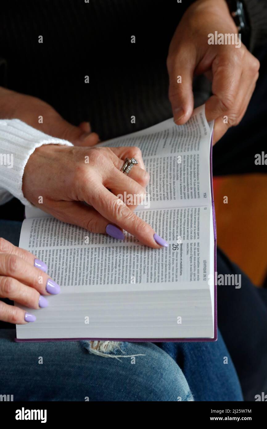 Man and woman reading the bible. Bible study. Stock Photo