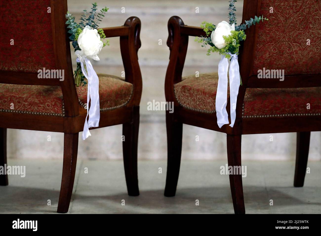 Two chairs in church. Wedding ceremony. Stock Photo