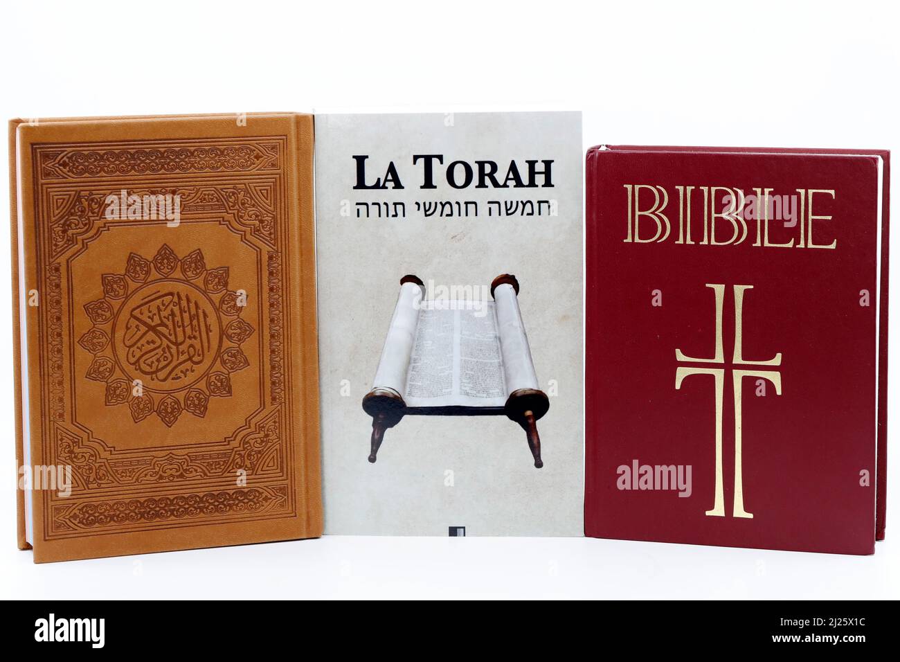 Christianity, Islam and Judaism.  Bible, Quran and Torah. Interfaith  or interreligious religious symbols.  Faith and spirituality concept. Stock Photo