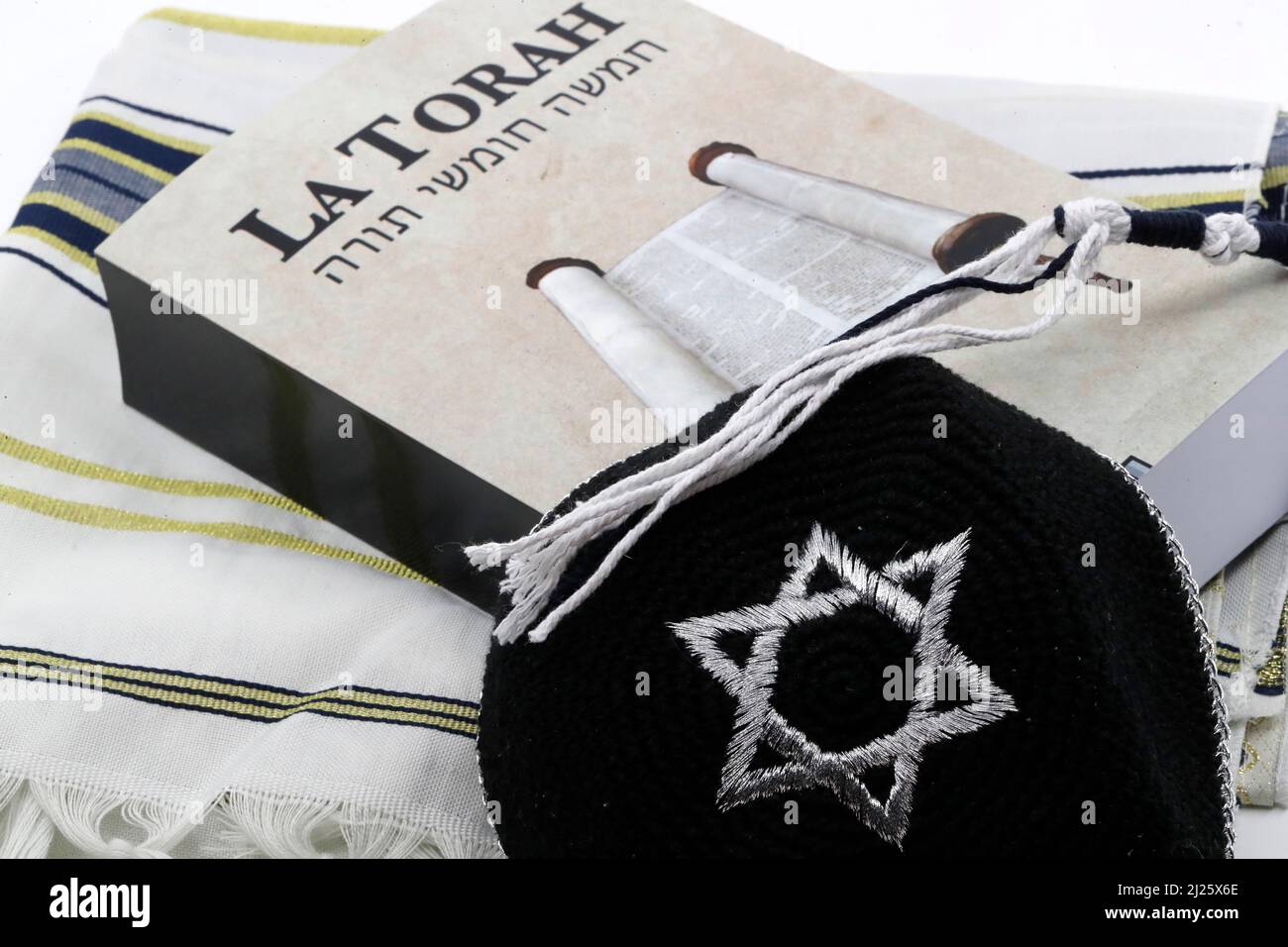 Torah, tallit  and kippah. Jewish symbols. Stock Photo