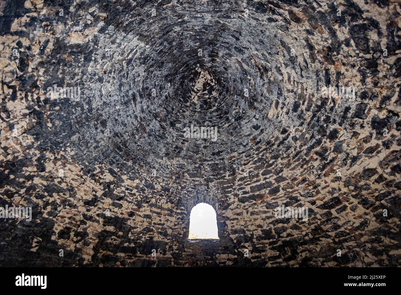 This is a straight-up view of the interior of one of the ten Wildrose Charcoal Kilns in Wildrose Canyon of Death Valley National Park, California, USA. Stock Photo