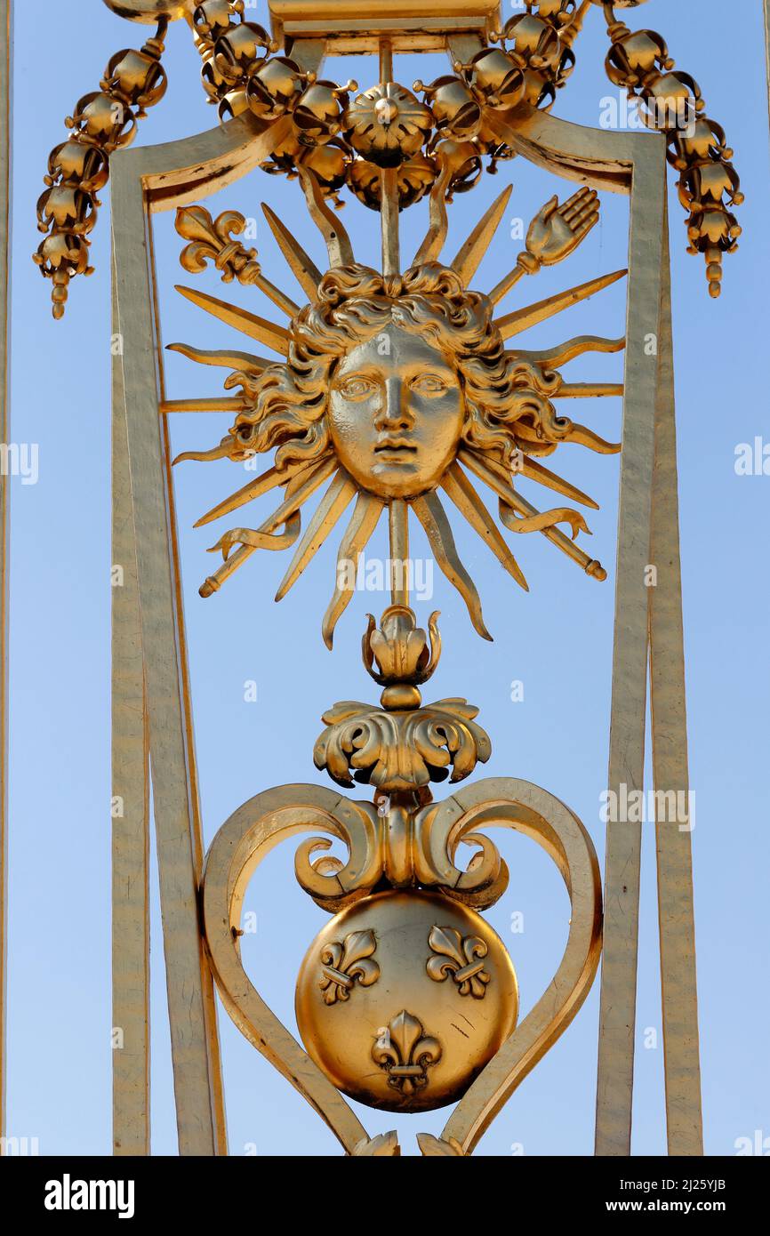 Main golden door in exterior facade of Versailles Palace,. Stock Photo