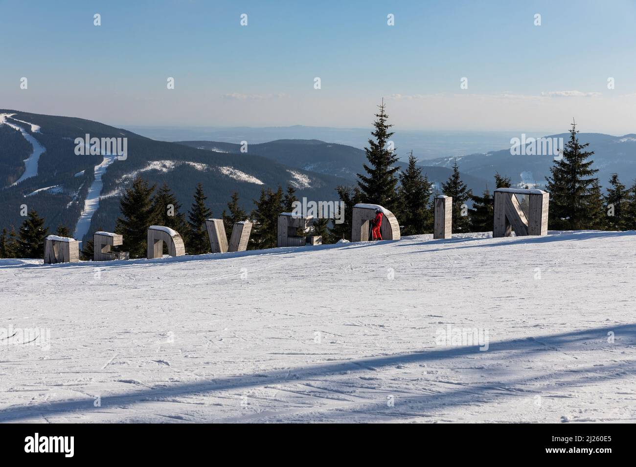 Medvedin, wooden letters at the top of the ski resort. Medvedin in mountain Krkonose, the most popular Czech ski resort Spindleruv Mlyn. Czech Republi Stock Photo