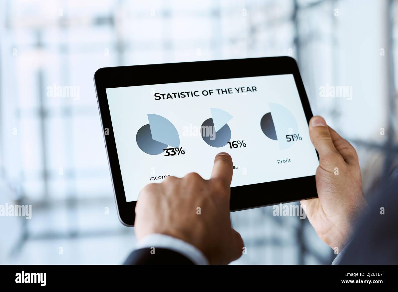 business man analyzing the annual data on cryptocurrency. Stock Photo