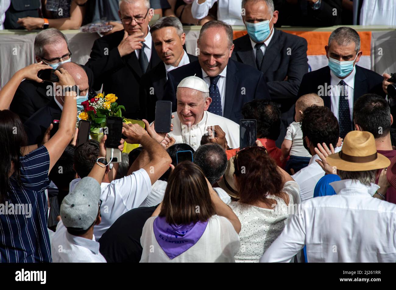 Pope Francis arrives at San Damaso courtyard in the Vatican for his weekly outdoors general audience. Stock Photo
