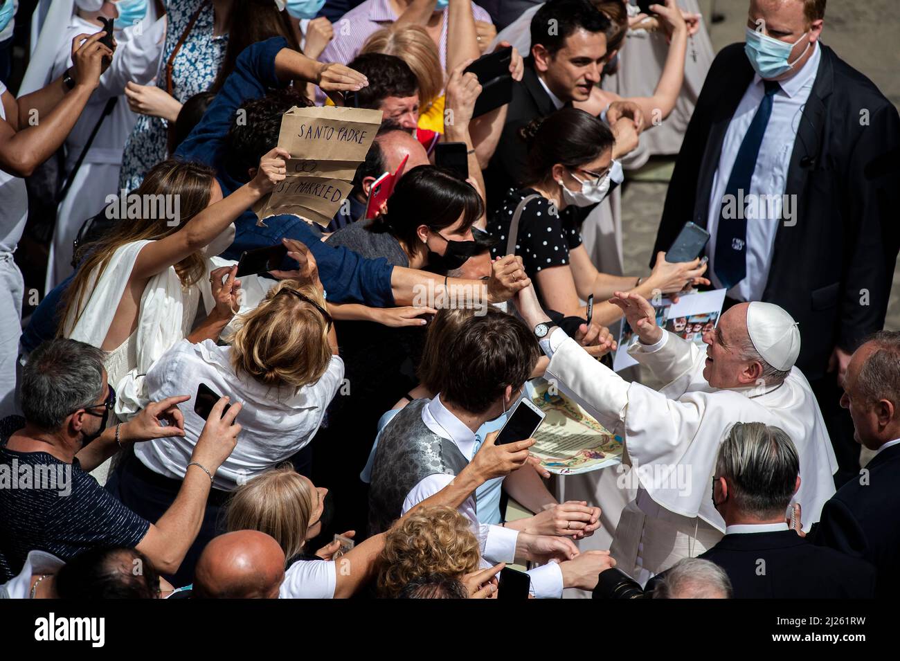 Pope Francis meets with attendees at the end of the weekly general audience at San Damaso courtyard in The Vatican. Stock Photo