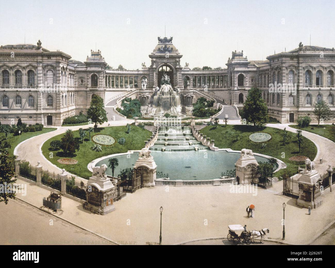 Chromolithography of the Palais Longchamp Park and Gardens with Fine Art Museum and Natural History Museum Above a Circular Shaped Basin or Pond and Château d'Eau with Fountain and Baroque Sculptures Marseille Provence France. c1880 Stock Photo