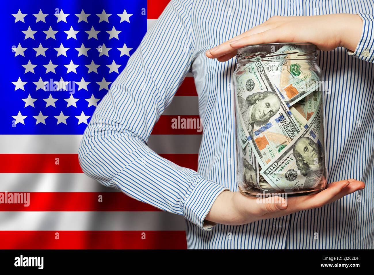 Banknotes of american dollar on national USA flag background Stock Photo
