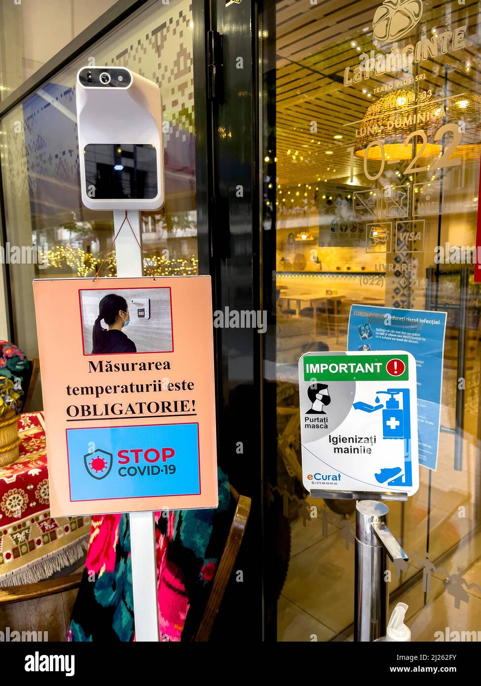 temperature check outside a shop in Chisinau, Moldova during covid-19 ...