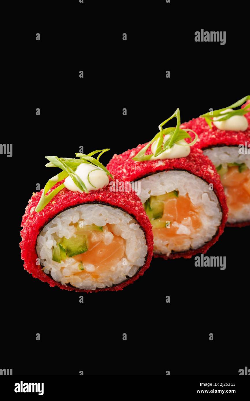 japanese sushi roll with salmon, japanese mayonnaise, chili sauce, rice