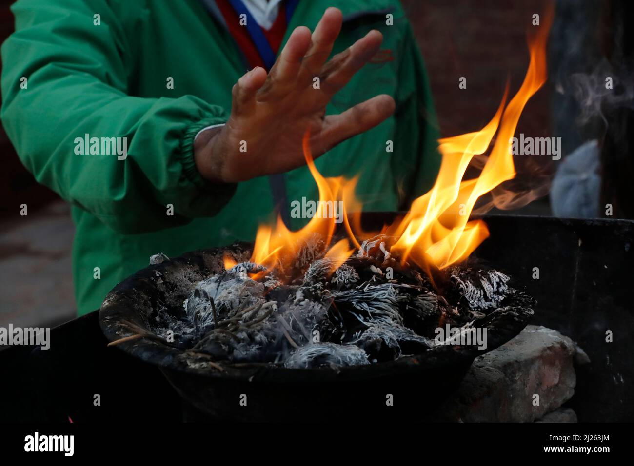 Hindu performing a fire ritual at Durbar Square Stock Photo - Alamy