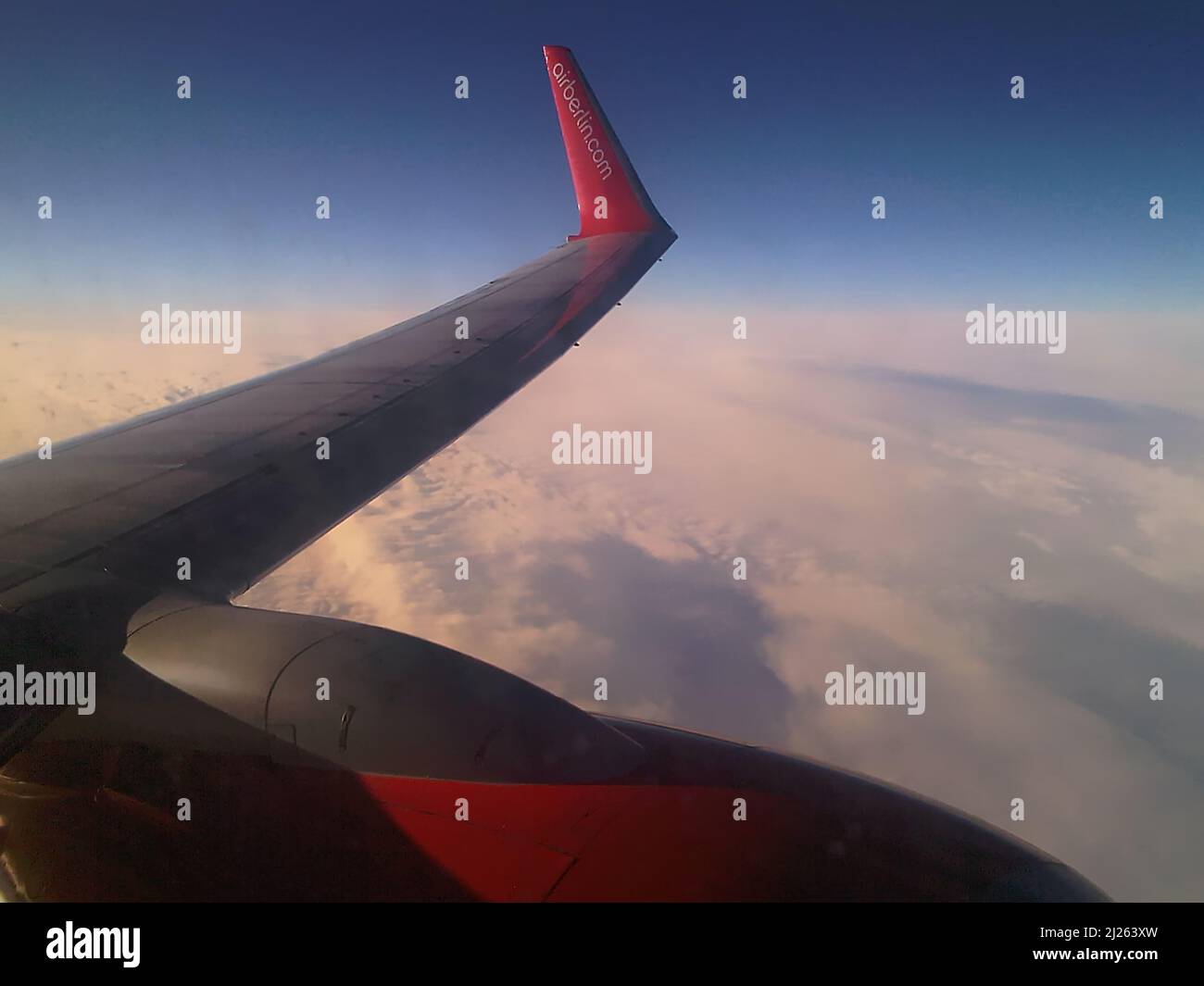 Plane over clouds wing view hi-res stock photography and images - Alamy