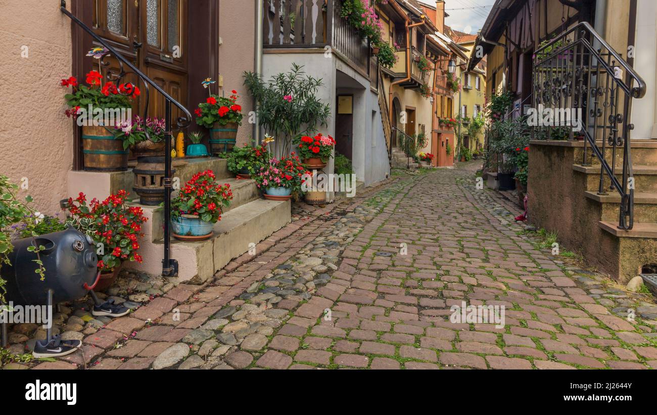 Alley with cobbelstones and medieval houses and gas tank Stock Photo