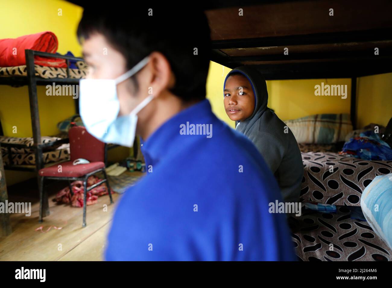 Dormitory. Rehabilitation center for street children. Boy with surgical