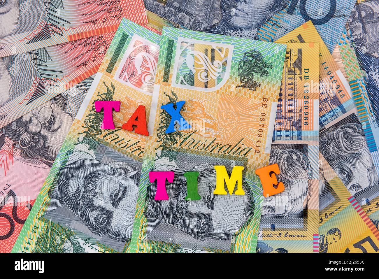'Tax Time' concept with australian dollars and clock on it close up Stock Photo