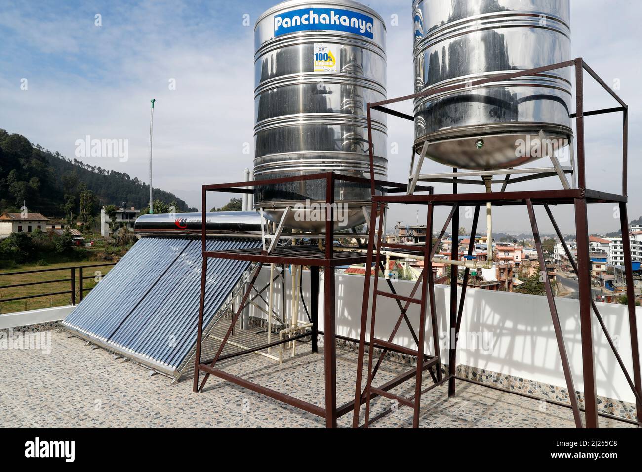Environmental friendly hot water heating system on a house Stock Photo