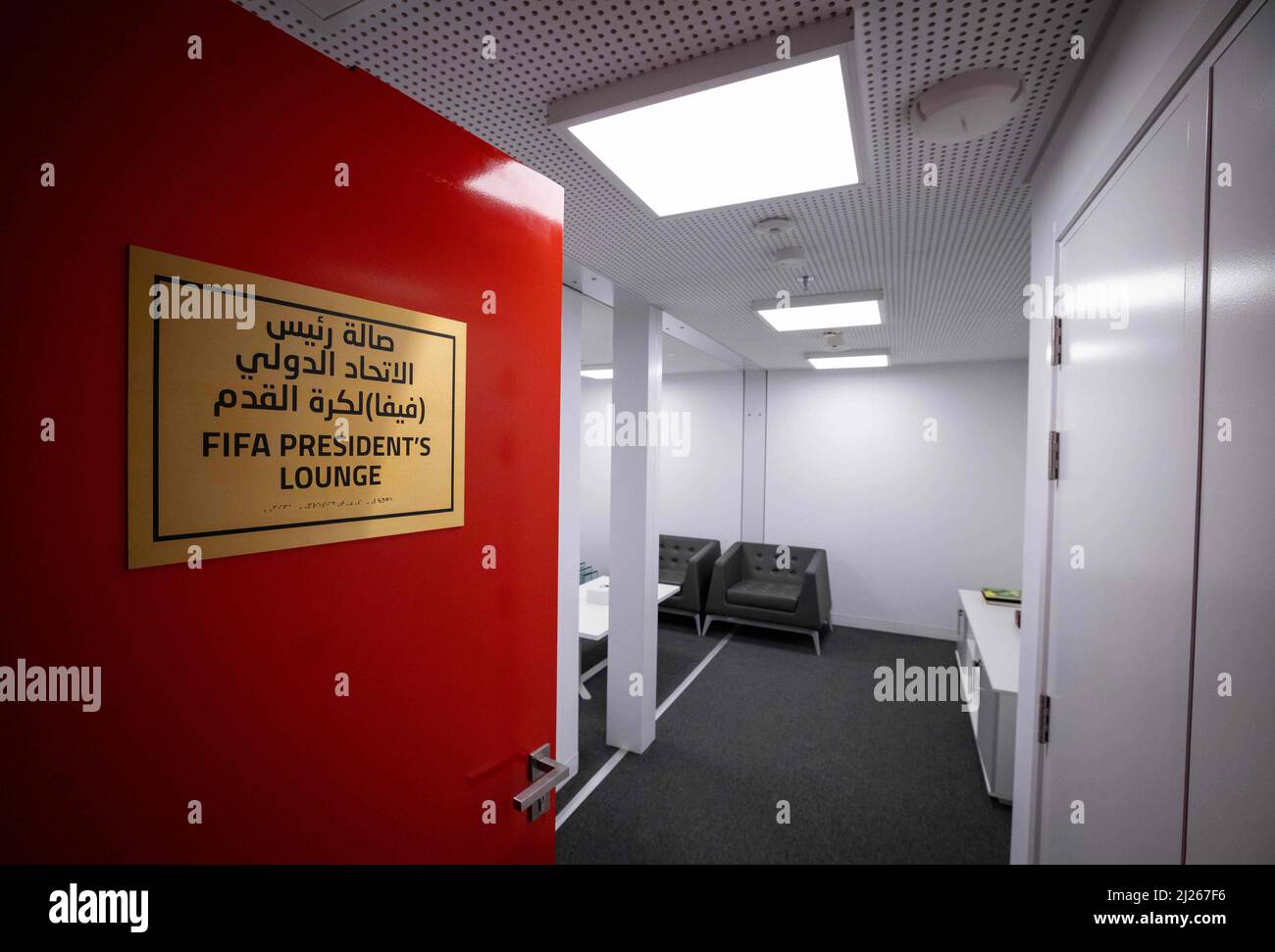 30 March 2022, Qatar, Doha: A sign reading 'FIFA President's Lounge' is seen on the door to the lounge in a shipping container at Stadium 974 during a Fifa media tour. 974 colorfully arranged shipping containers were used to build the stadium. Doha will host the Fifa Congress on March 31 and the draw for the 2022 World Cup in Qatar on April 1. Photo: Christian Charisius/dpa Stock Photo