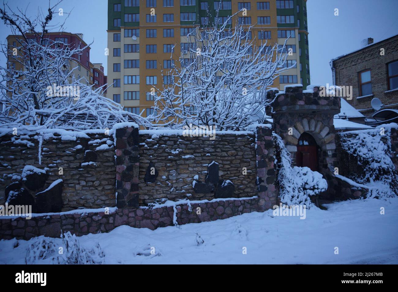 Car under the snow in the city Stock Photo