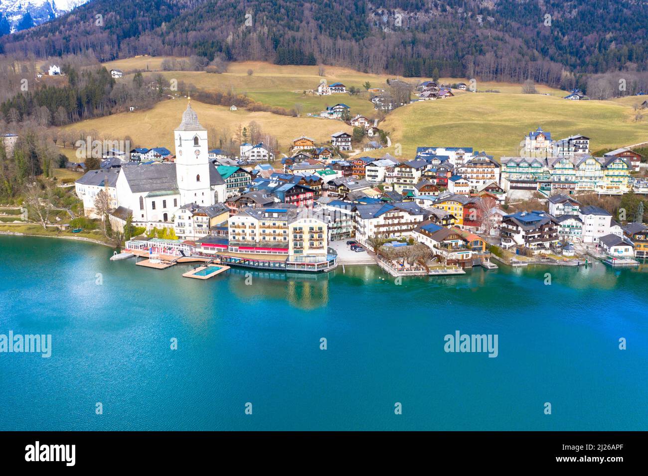 Beautiful aerial view from the popular village Sankt Wolfgang im Salzkammergut. Alps mountains, church and Lake Wolfgang. Upper Austria, Salzburg Stock Photo