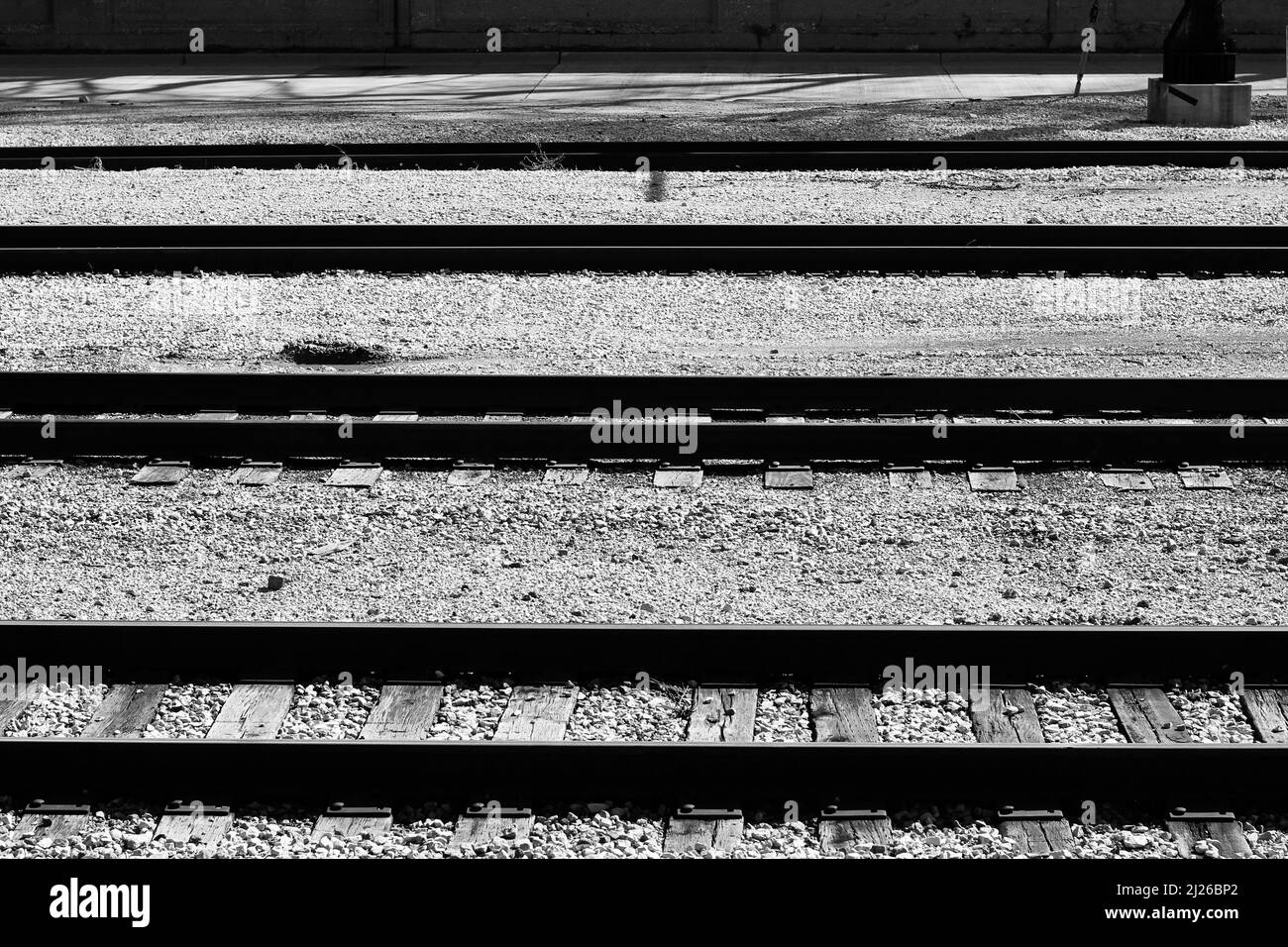 Railroad tracks at the local public train station Stock Photo Alamy