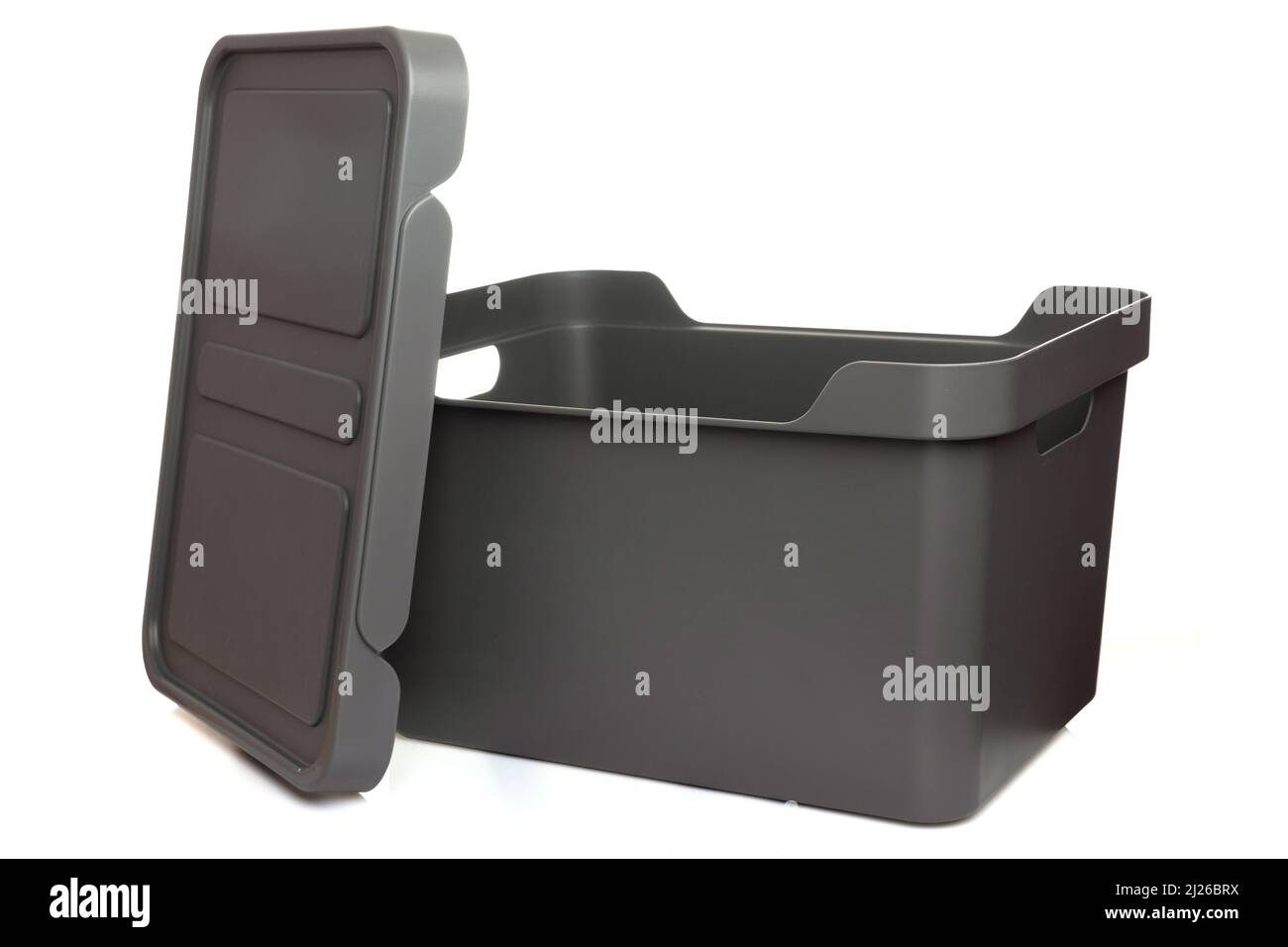 gray plastic storage box with lid and handles on a white isolated