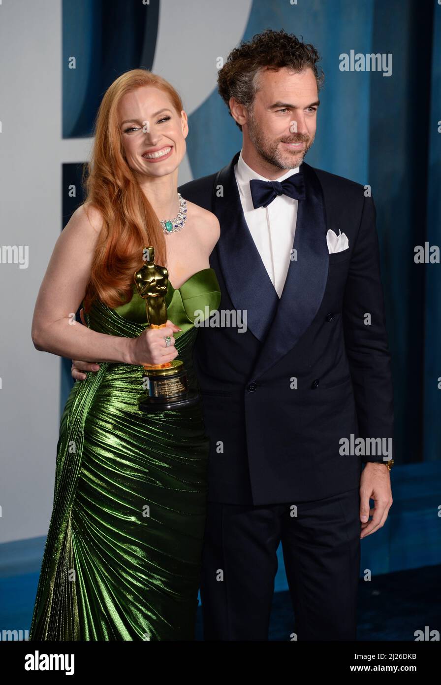 March 27th, 2022, Los Angeles, USA. Jessica Chastain and husband Gian Luca Passi de Preposulo attending the Vanity Fair Oscar Party 2022, Wallis Annen Stock Photo