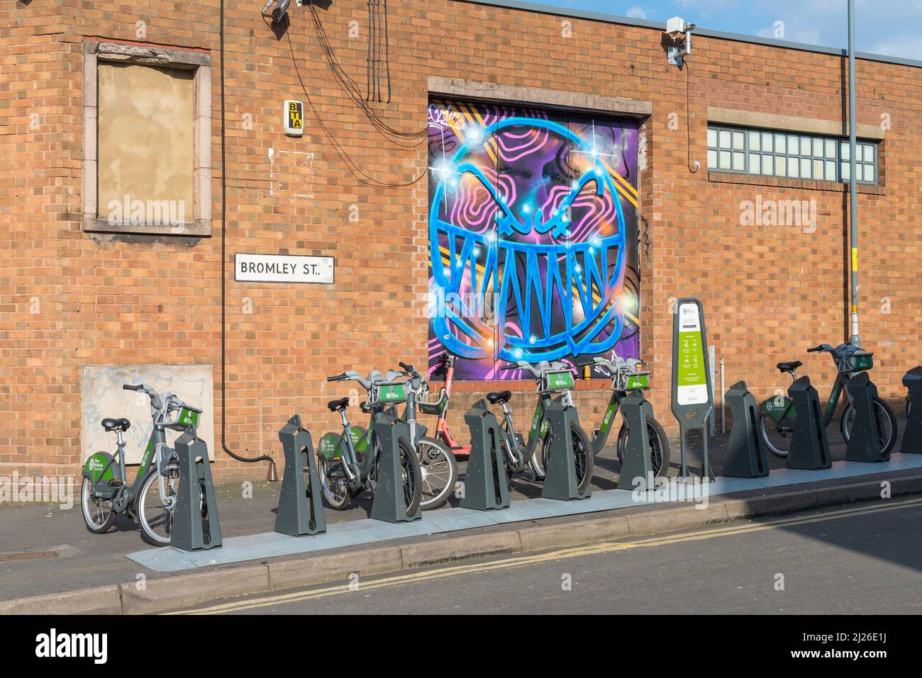 Row of West Midlands Cycle Hire bicycles awaiting hire in Digbeth, Birmingham Stock Photo