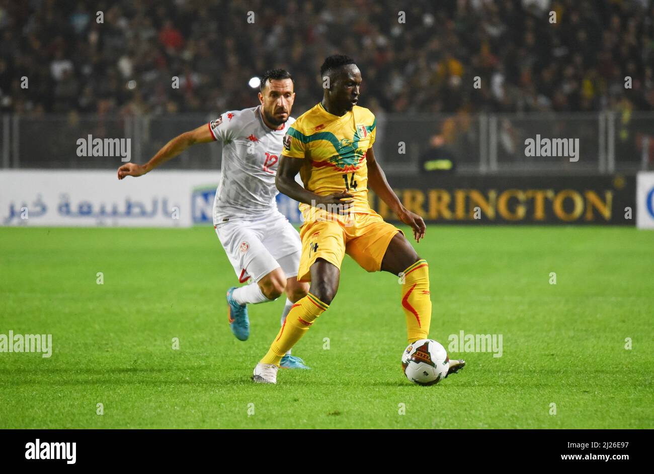 Tunis, Tunisia. 29th Mar, 2022. Ali Maaloul of Tunisia in action against Adama Traore (R) of Mali during the second leg of the 2022 Qatar World Cup African Qualifiers football match between Tunisia and Mali at the Hamadi Agrebi Olympic stadium in the city of Rades. Final score First Match; Tunisia 1:0 Mali, Second Match; Tunisia 0:0 Mali. (Photo by Jdidi Wassim/SOPA Images/Sipa USA) Credit: Sipa USA/Alamy Live News Stock Photo