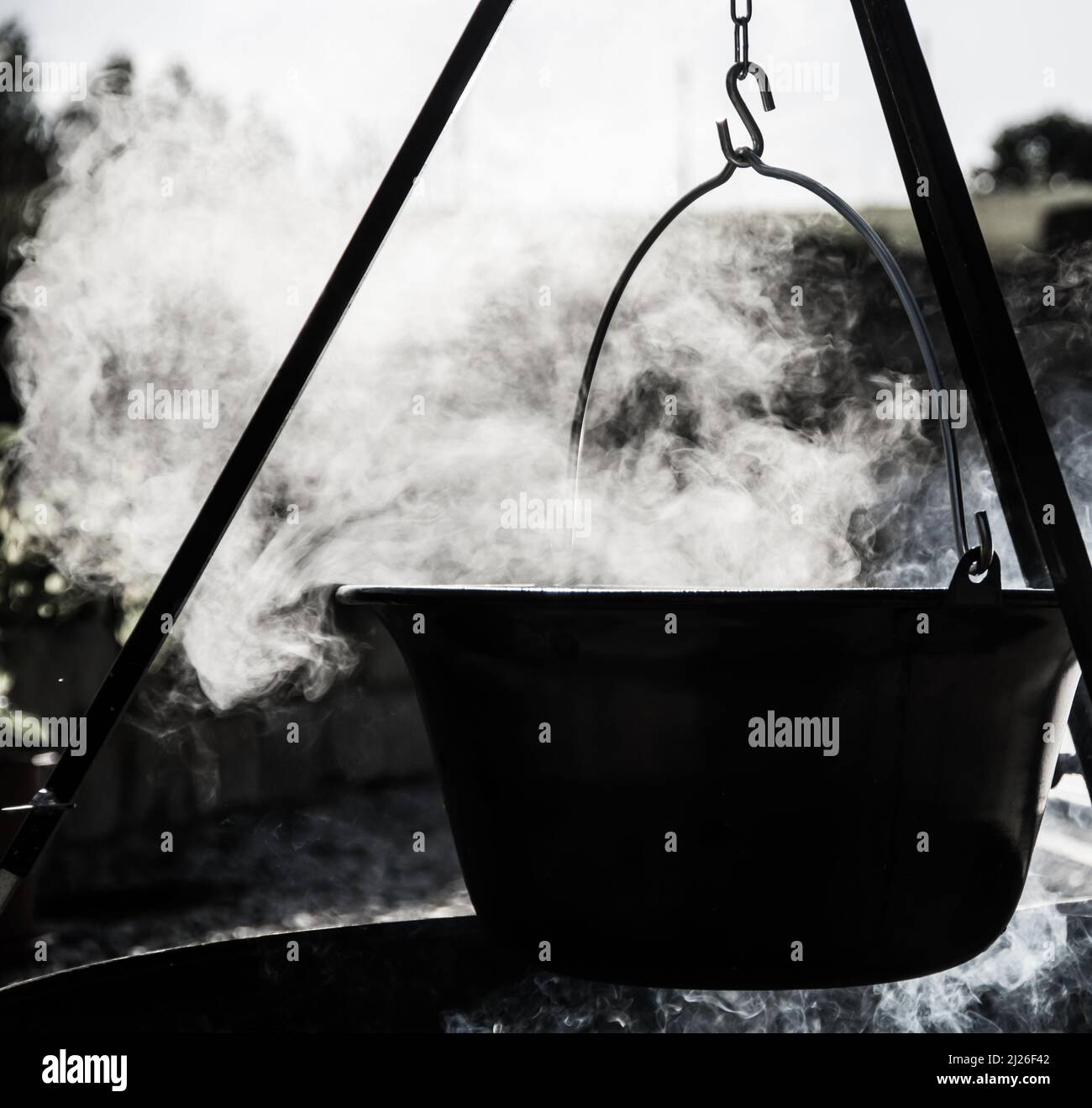 Cooking in the kettle over the fire bowl Stock Photo - Alamy