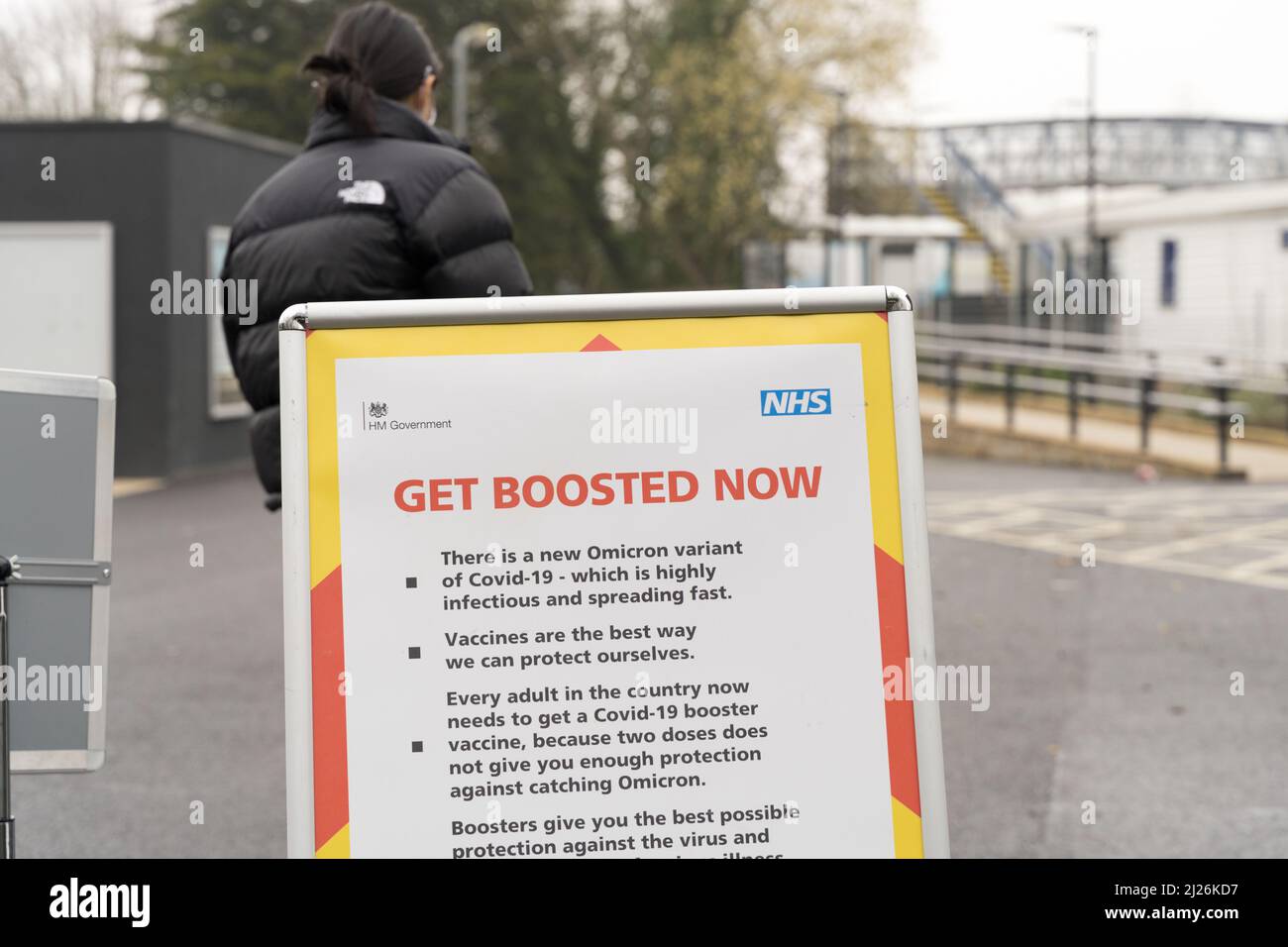Kent, UK. 30th March 2022. Local resident queue for covid-19 vaccination at mobile unit provided by NHS staffs in Sevenoaks Kent as UK government to end the provision of universally free lateral flow and PCR home test kits on Friday 1st April. 15 minutes  of observation period is no longer required. Credit: glosszoom/Alamy Live News Stock Photo