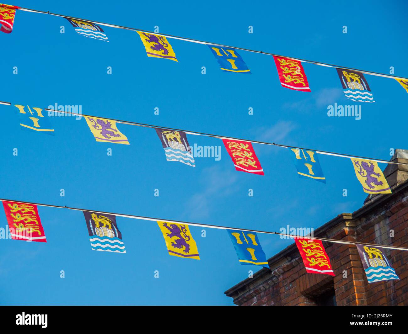 Heraldic flags on display in Congleton, Cheshire, UK. in celebration of the Town's 750th anniversary of the Charter Stock Photo