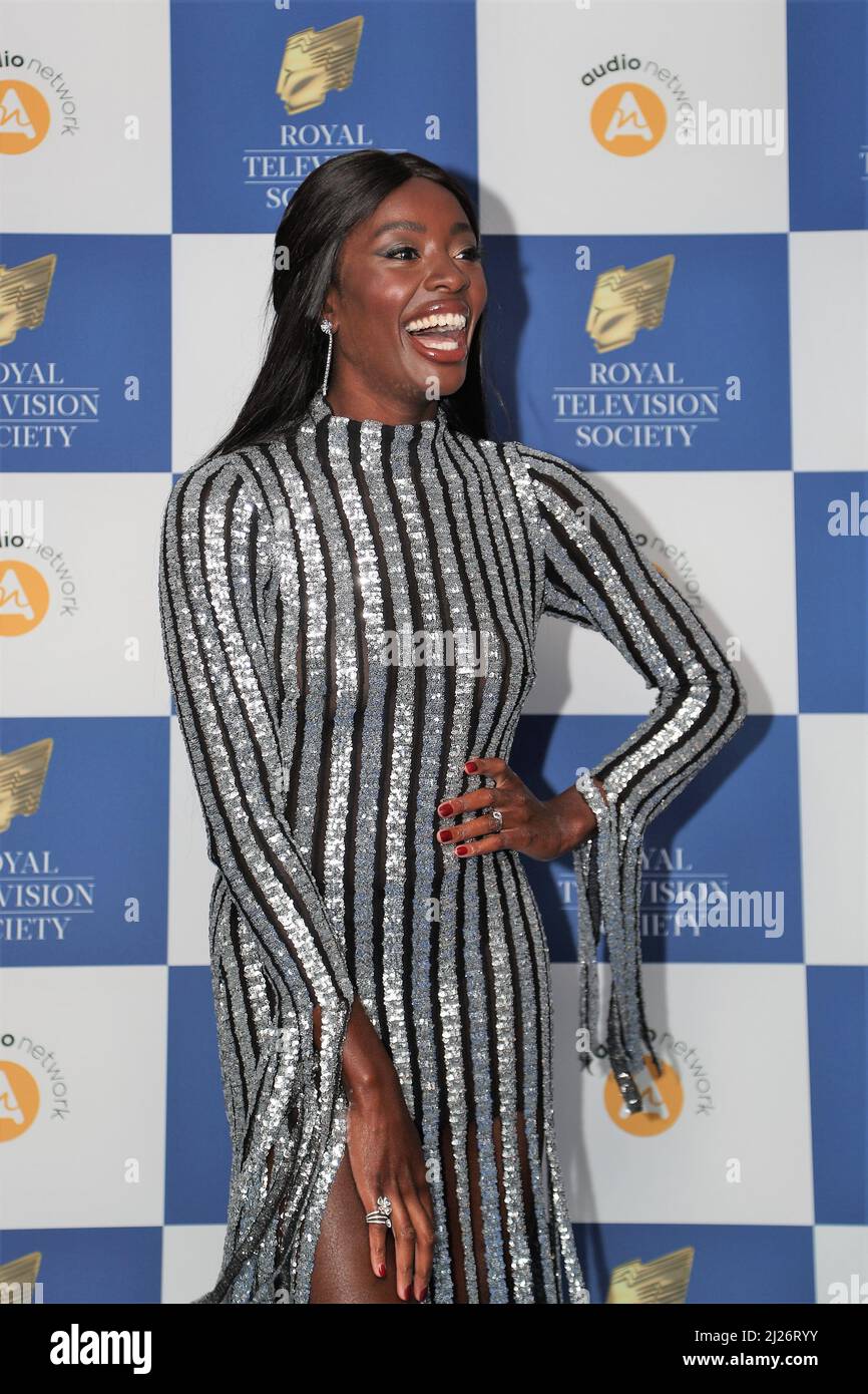 Actress AJ Odudu arriving for the Royal Television Society Programme Awards at the Grosvenor House In Mayfair, London, UK Stock Photo