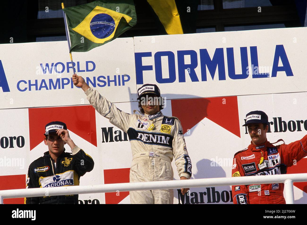 Ayrton Senna da Silva (BRA) 2nd position Nelson Piquet (BRA) Williams 1st position Nigel Mansell (GBR) Williams 3rd position celebrates podium Stock Photo