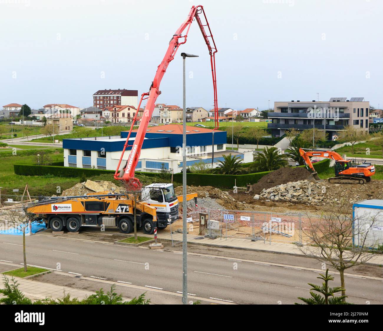 Mercedes Benz truck mounted 47.5 Putzmeister Concrete Pump being used at a  construction site Santander Spain Stock Photo - Alamy