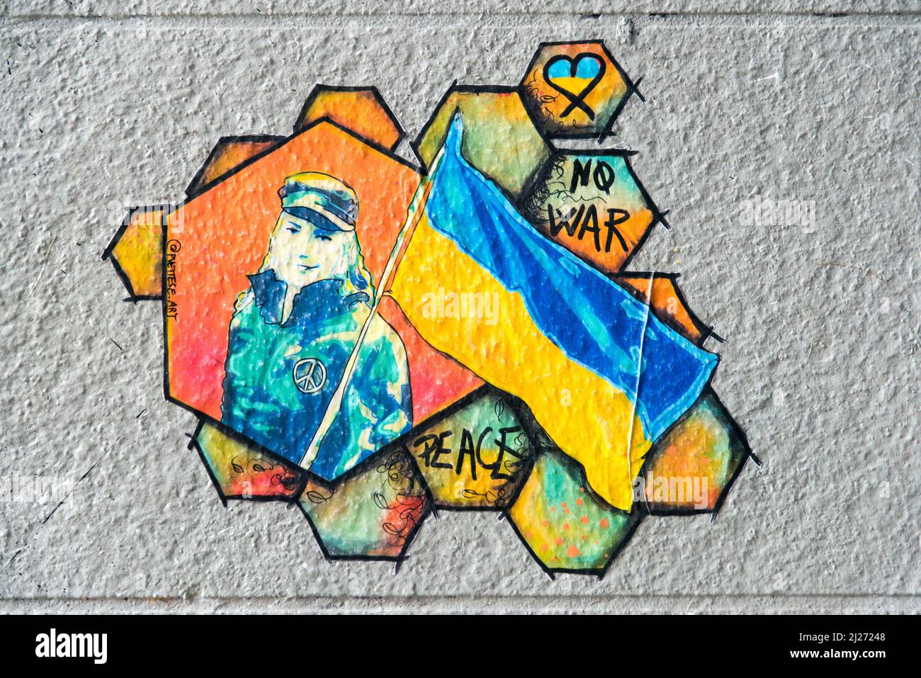 Street artists call for peace in Ukraine. This weekend, Spot13 and the Lavomatik (20 Bd du Général Jean Simon, 75013 Paris) invited stencil artists and gluers to come and post messages of peace and love on the walls. Paris, France, on March 30, 2022. Photo by Denis Prezat/ABACAPRESS.COM Stock Photo