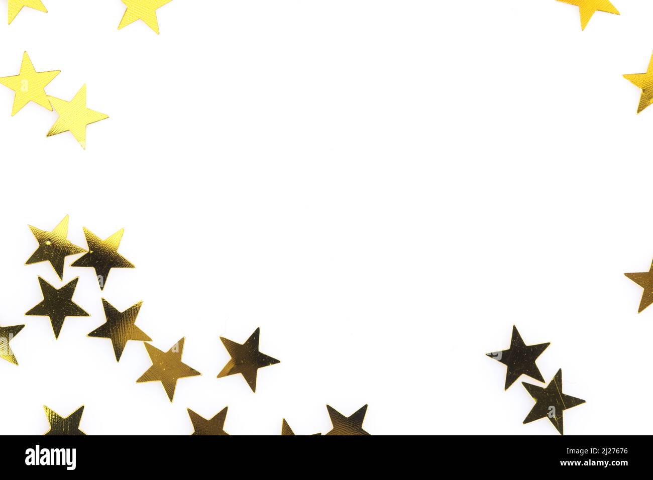 a photo of gold stars isolated on white background Stock Photo - Alamy