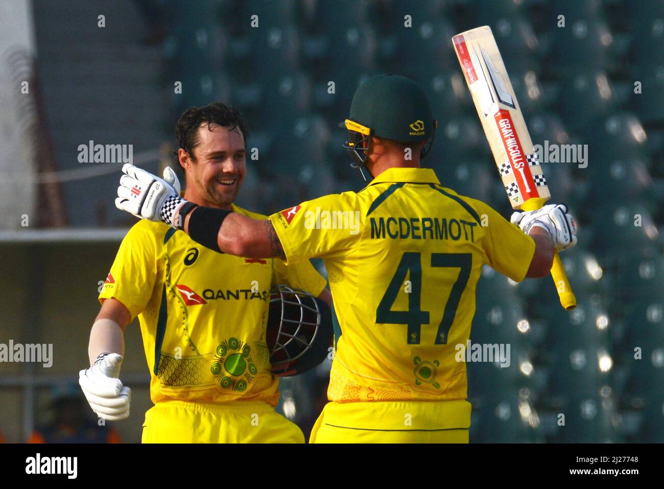 Lahore, Pakistan. 29th Mar, 2022. Australian player Travis Head completed his 100 up runs during first one-day international (ODI) cricket match between Pakistan and Australia at the Gaddafi Cricket Stadium in Provincial Capital. (Photo by Rana Sajid Hussain/Pacific Press) Credit: Pacific Press Media Production Corp./Alamy Live News Stock Photo
