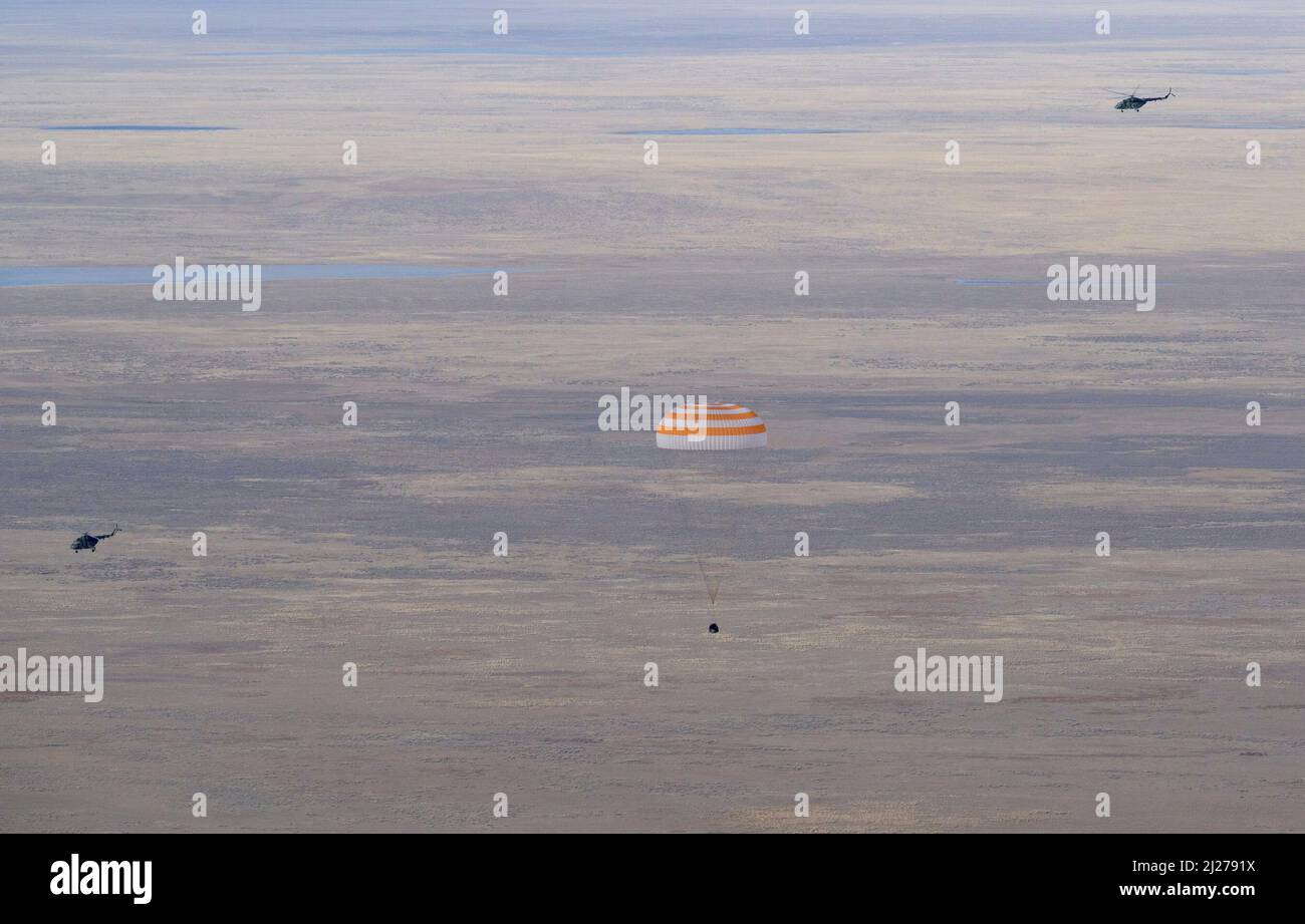 Zhezkazgan, Kazakhstan. 30th Mar, 2022. The Soyuz MS-19 spacecraft is seen as it lands in a remote area near the town of Zhezkazgan, Kazakhstan with Expedition 66 crew members Mark Vande Hei of NASA, and cosmonauts Pyotr Dubrov, and Anton Shkaplerov of Roscosmos, Wednesday, March 30, 2022. Vande Hei and Dubrov are returning to Earth after logging 355 days in space as members of Expeditions 64-66 aboard the International Space Station. Credit: dpa picture alliance/Alamy Live News Stock Photo