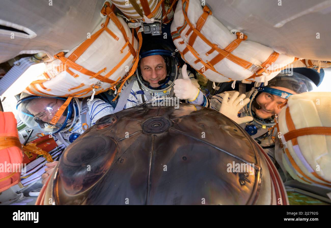 Zhezkazgan, Kazakhstan. 30th Mar, 2022. Expedition 66 crew members Mark Vande Hei of NASA, left, cosmonauts Anton Shkaplerov, center, and Pyotr Dubrov of Roscosmos, are seen inside their Soyuz MS-19 spacecraft after is landed in a remote area near the town of Zhezkazgan, Kazakhstan, Wednesday, March 30, 2022. Vande Hei and Dubrov are returning to Earth after logging 355 days in space as members of Expeditions 64-66 aboard the International Space Station. Credit: dpa picture alliance/Alamy Live News Stock Photo