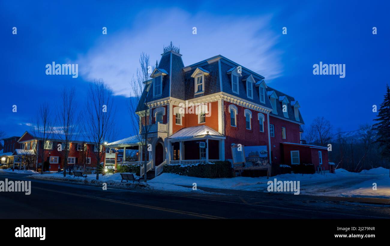 the main street of the city of Bromont with the Ski Mountain in the background. Eastern