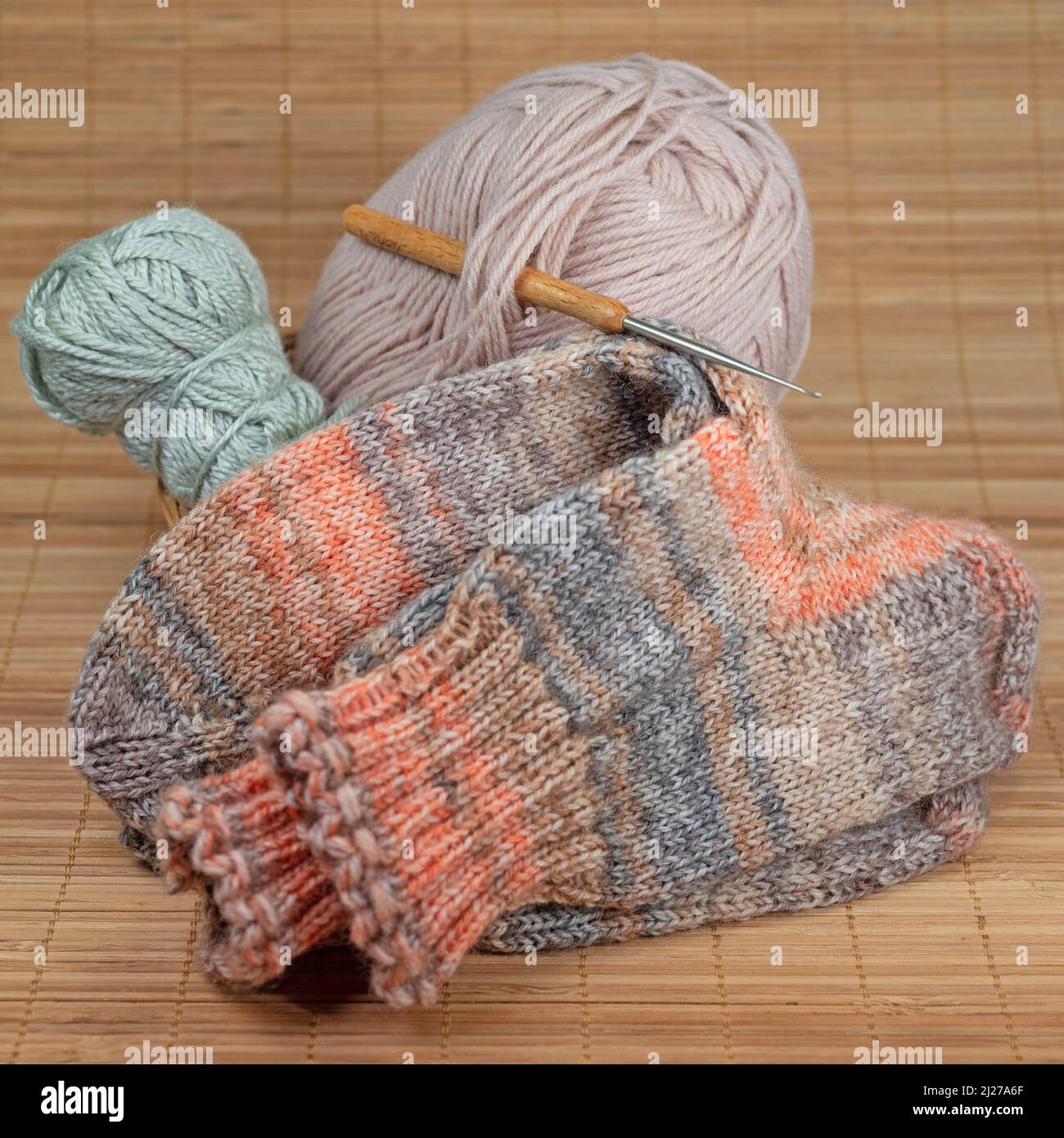Crochet yarn and crochet hook in a closeup Stock Photo