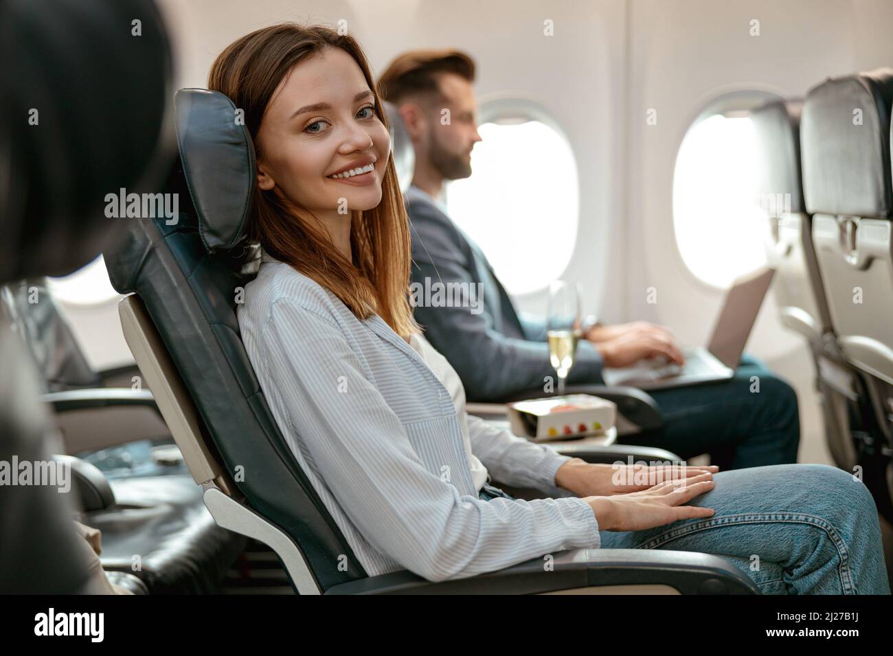 Aeroplane passenger seat woman hi-res stock photography and images - Alamy