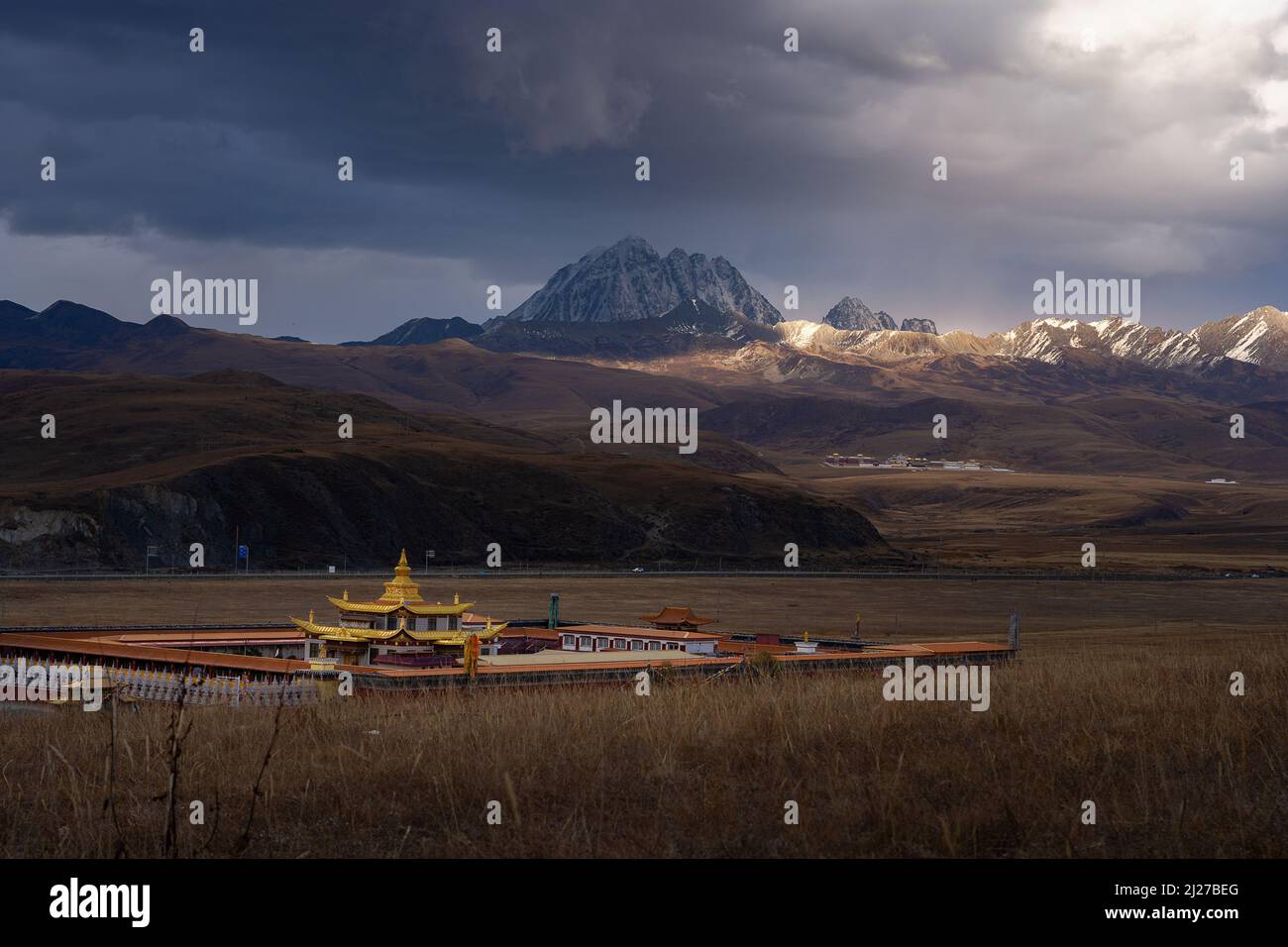 Tagong Monastery A view of Tagong Monastery with beautiful mountains behind in Tagong ...