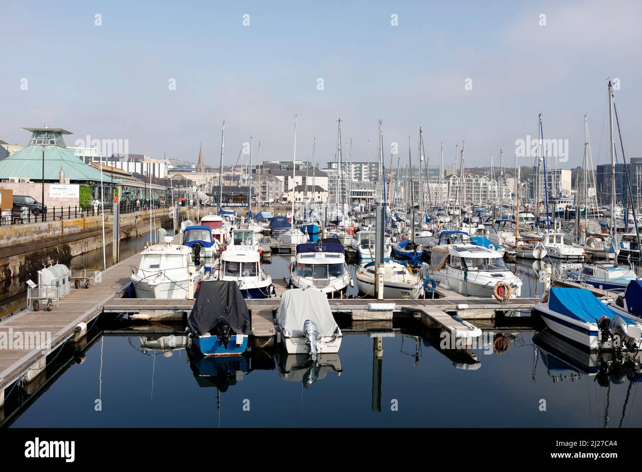 Plymouth, Devon, UK. 30th March, 2022. A sunny spring day in the Barbican in Plymouth.  The Barbican is a popular tourist area with many Marinas. Stock Photo