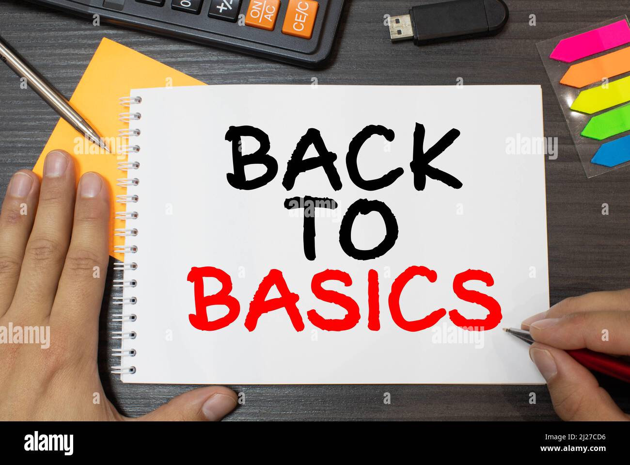 Business concept. Notebook with text BACK TO BASIC sheet of white paper ...