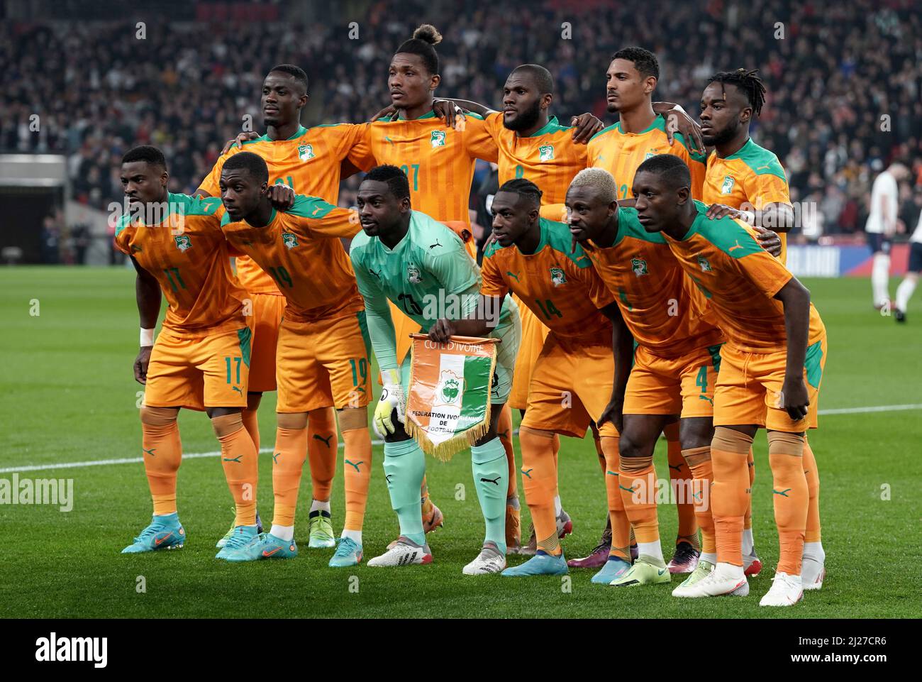 Back row, left to right, Ivory Coast's Eric Bailly, Simon Deli, Franck Kessie, Sebastien Haller and Maxwel Cornet. Front row, left to right, Ivory Coast's Serge Aurier, Nicolas Pepe, Badra Ali Sangare, Hassane Kamara, Jean Seri and Max Gradel line up before the international friendly match at Wembley Stadium, London. Picture date: Tuesday March 29, 2022. Stock Photo