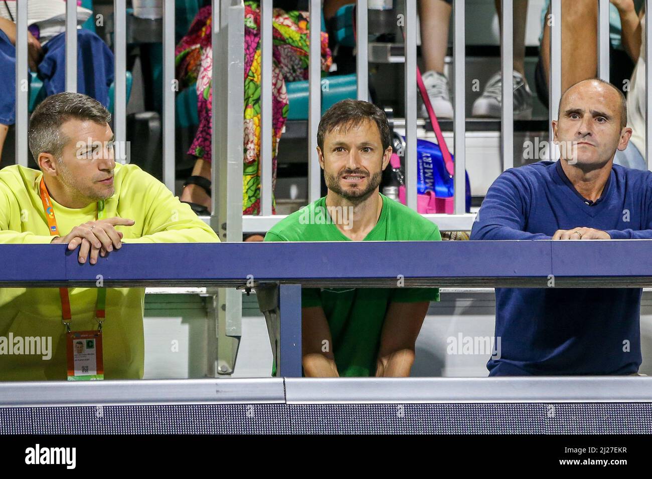 March 29, 2022, Miami Gardens, Florida, United States: Juan Carlos Ferrero,  coach for Carlos Alcaraz (ESP) (C), watches play during the men's singles  fourth round at the Miami Open presented by Itau