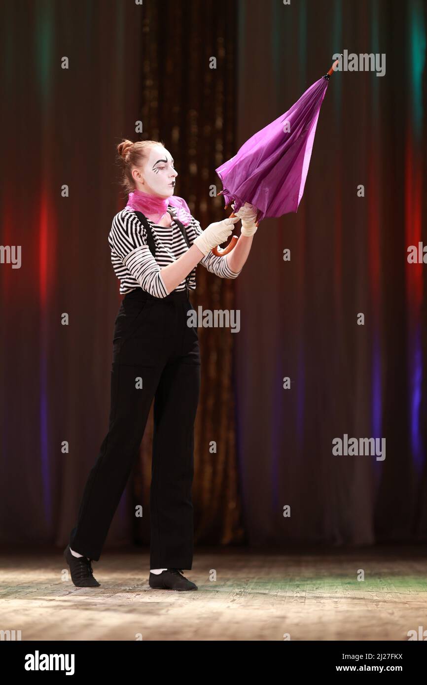 Actress girls clowns show performance on stage Stock Photo - Alamy