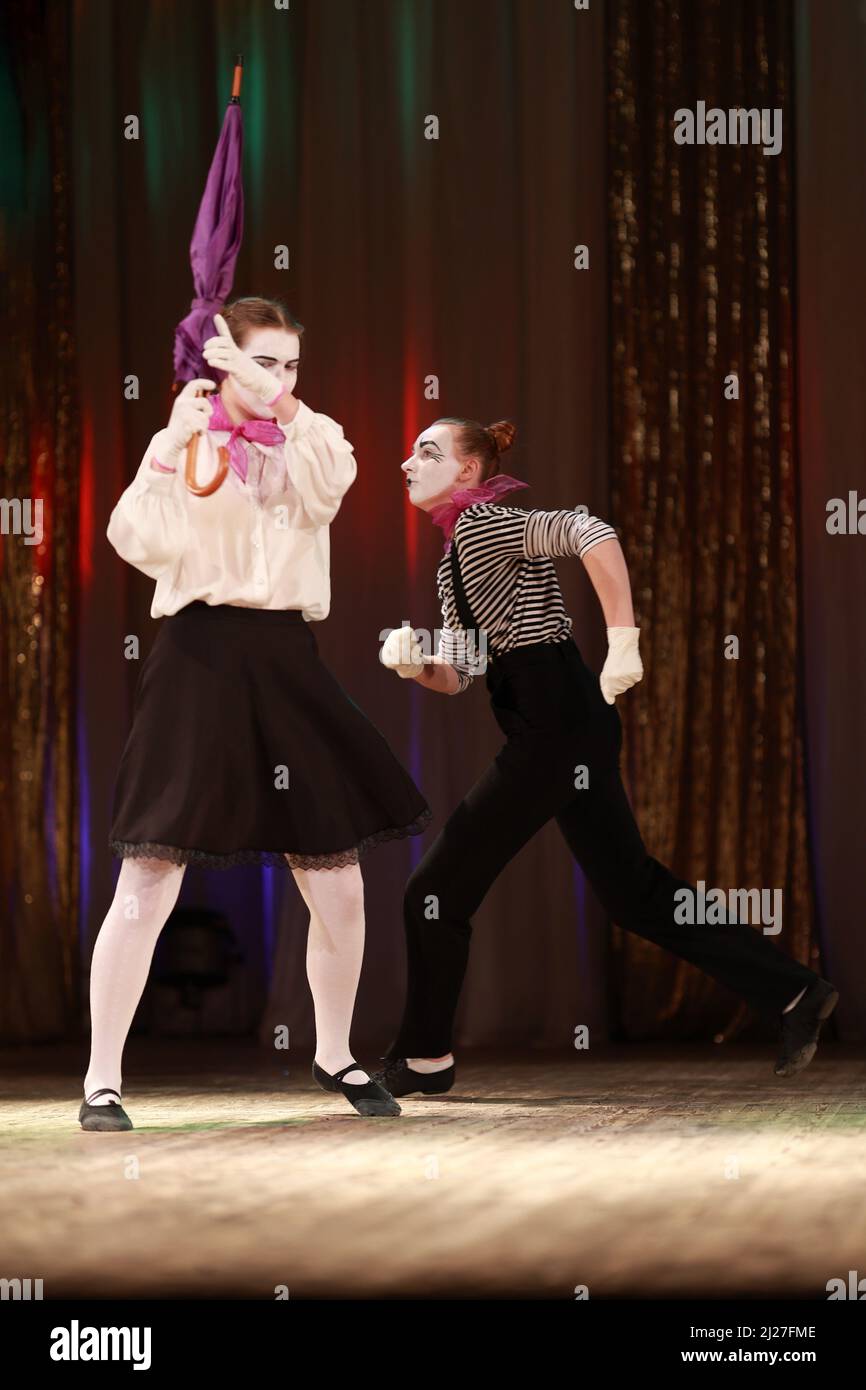 Actress girls clowns show performance on stage Stock Photo - Alamy